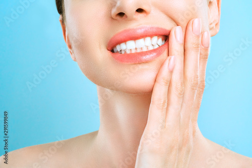 Tooth Pain And Dentistry. Young Woman Suffering From Strong Teeth Pain, Touching Cheek With Hand. Female Feeling Painful Toothache. Dentistry Care Concept photo