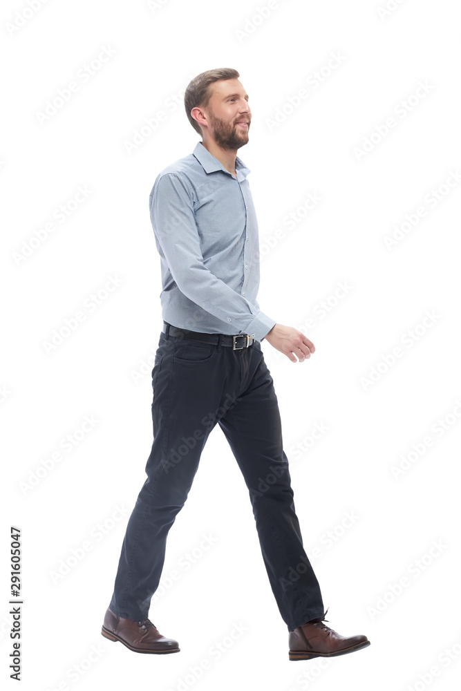 full growth.confident business man goes forward . isolated full growth.confident business man goes forward . isolated