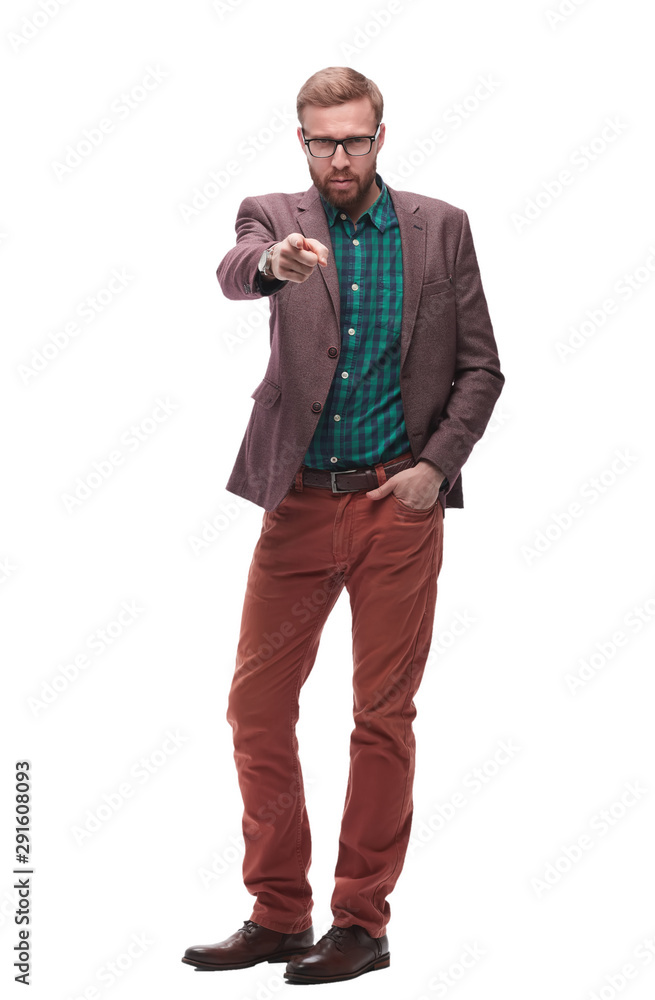 in full growth. serious man pointing at you . isolated on white in full growth. serious man pointing at you . isolated on white