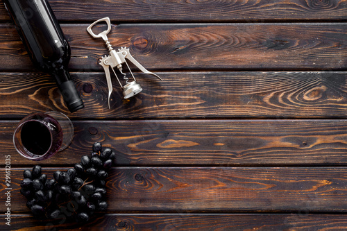 Testing wine concept. Top view dark wooden background copy space
