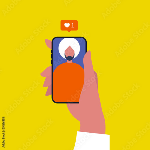 Social media reactions: pop up like window. SMM. Content. Young indian male Internet user. Hand holding a smartphone. Flat editable vector illustration, clip art