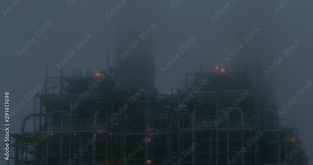 Fog Rolls Across Power Plant Pipes At Night Fog Rolls Across Power Plant Pipes At Night