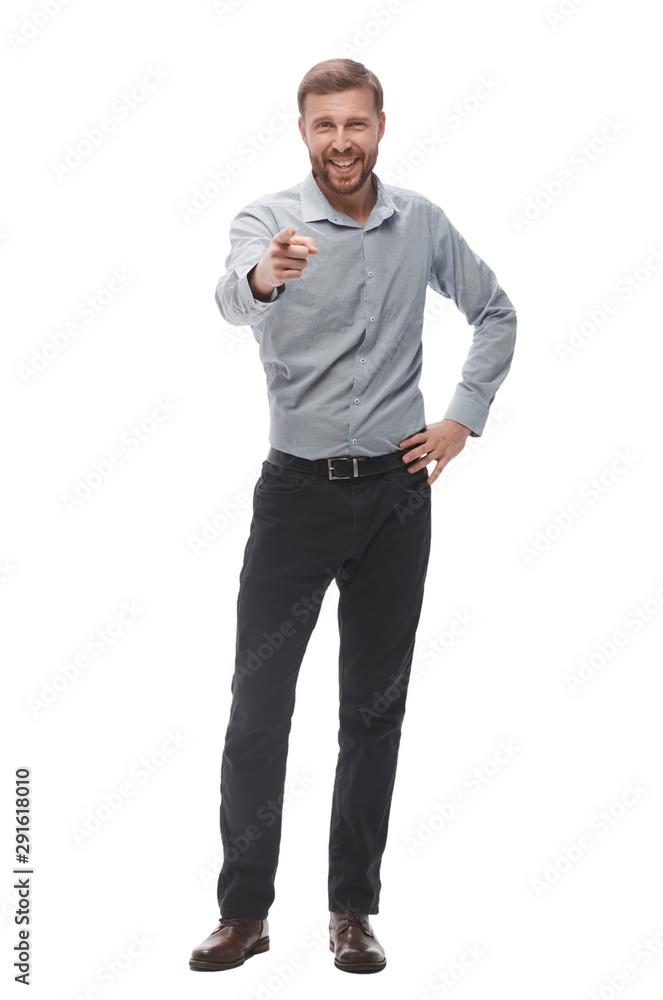 in full growth. serious young businessman pointing at you in full growth. serious young businessman pointing at you