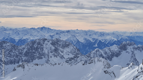 Alpine mountains, panoramic view from the top of the Zugspitze peak, Germany. It lies south of the town of Garmisch-Partenkirchen.                                © vadim_ozz
