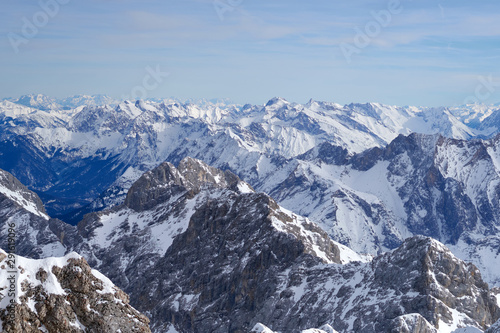 Alpine mountains  panoramic view from the top of the Zugspitze peak  Germany. It lies south of the town of Garmisch-Partenkirchen.                               
