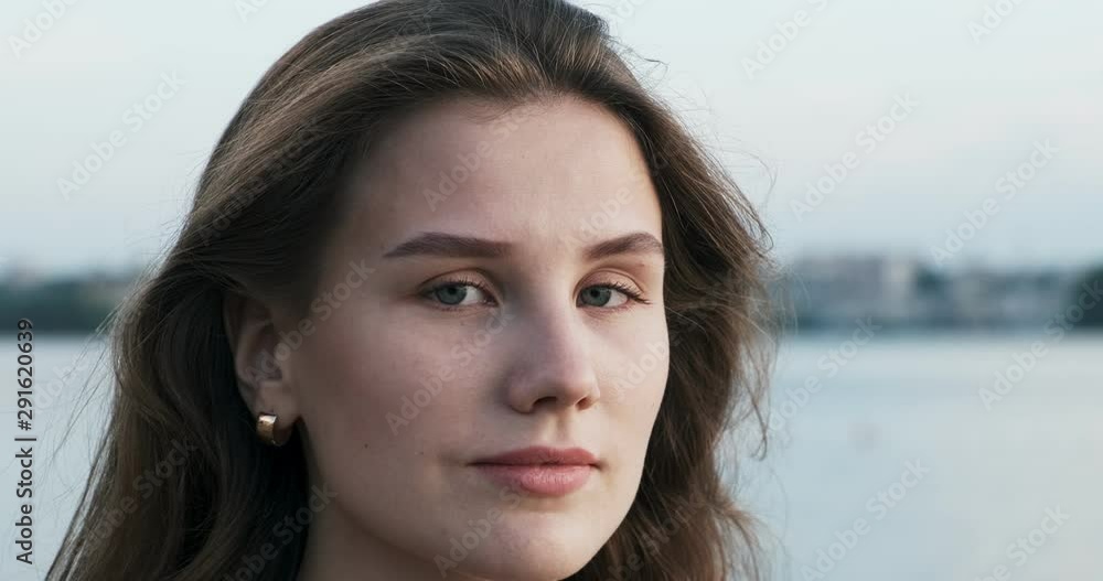 Wonderful woman with a lovely look and natural make up looking at camera Wonderful woman with a lovely look and natural make up looking at camera