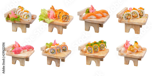 Fototapeta Naklejka Na Ścianę i Meble -  Japanese Cuisine - Sushi Roll on wood plate in white background
