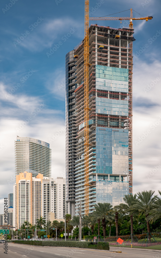 Fototapeta premium Photo of the Turnberry Ocean Club Residences under construction shot from collins avenue