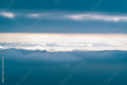 At top of mountain with sunlight and cloud © dodotone