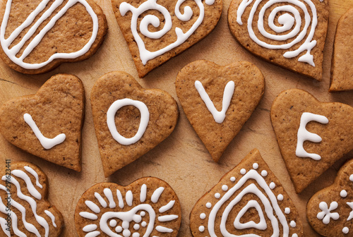 Heart of the cookie and wooden background.