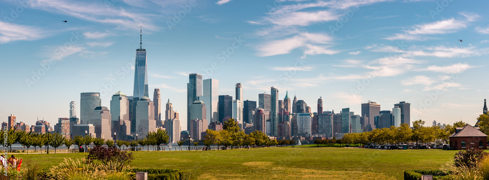 New York Skyline showing several prominent buildings and hotels under a blue sky.
