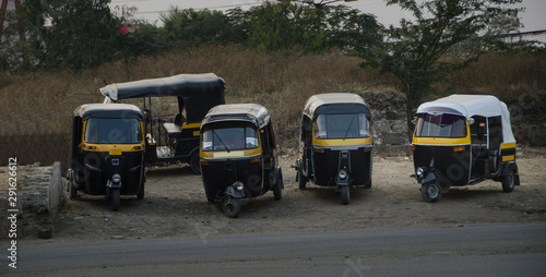 Black and yellow, india Taxi (TukTuk) © Runglawan