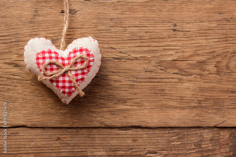 Valentines day background with handmaded hearts over wood Valentines day background with handmaded hearts over wood
