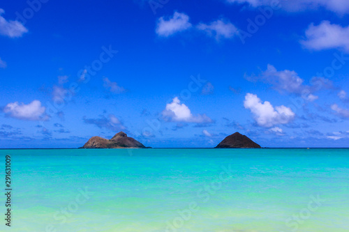 Beautiful view of the Lanikai Beach with the twin islands of Na Mokulua off shore in Haiwaii