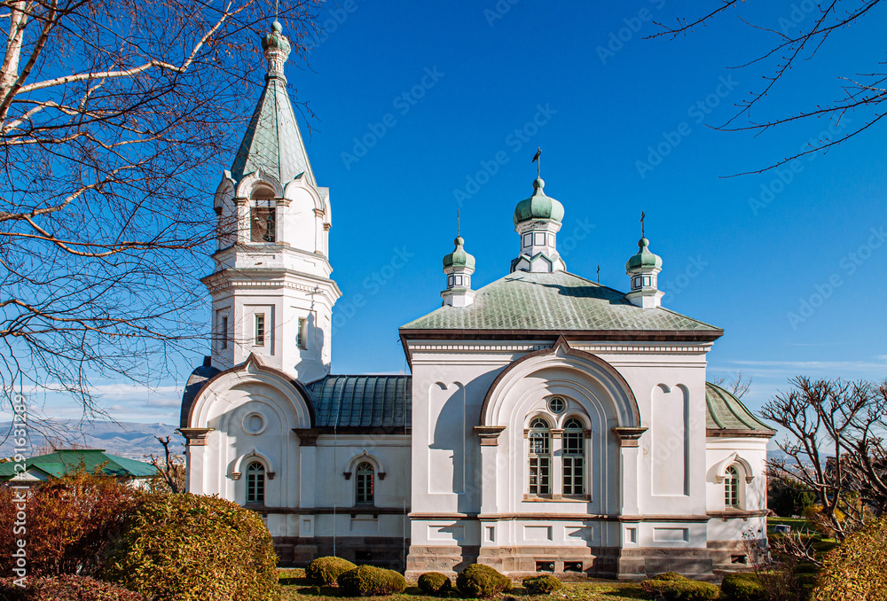 Fototapeta premium Hakodate Orthodox Church - Russian Orthodox church in winter under blue sky