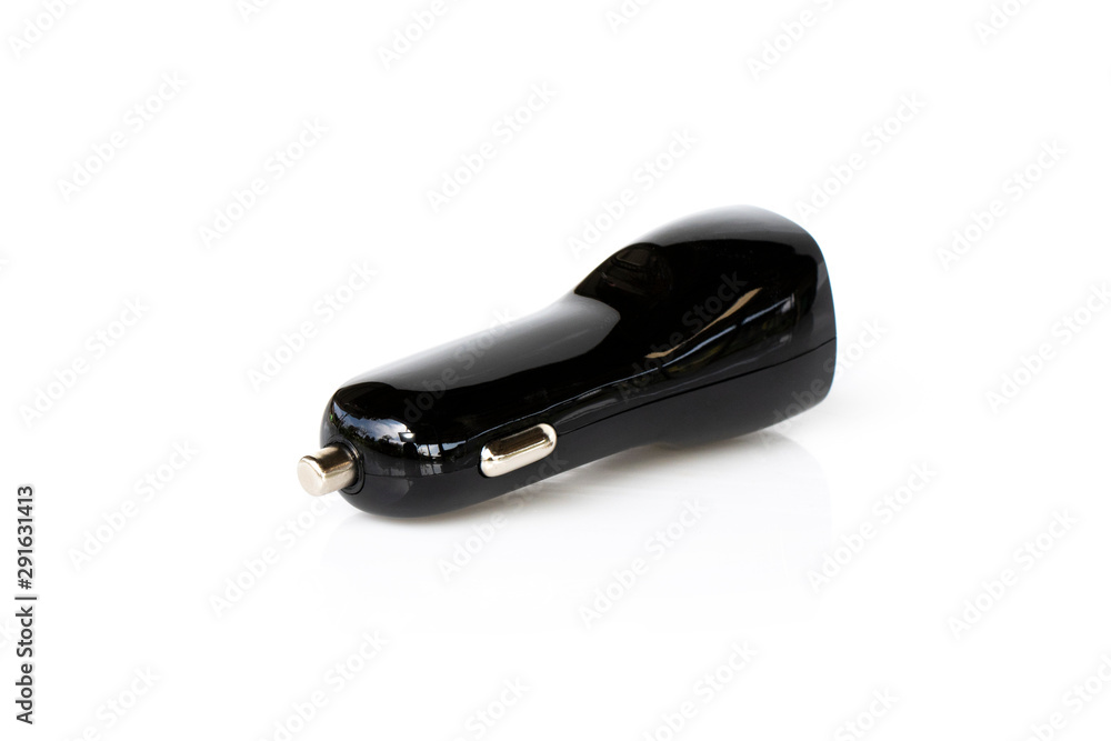 Image of black USB car charger isolated on white background. Image of black USB car charger isolated on white background.