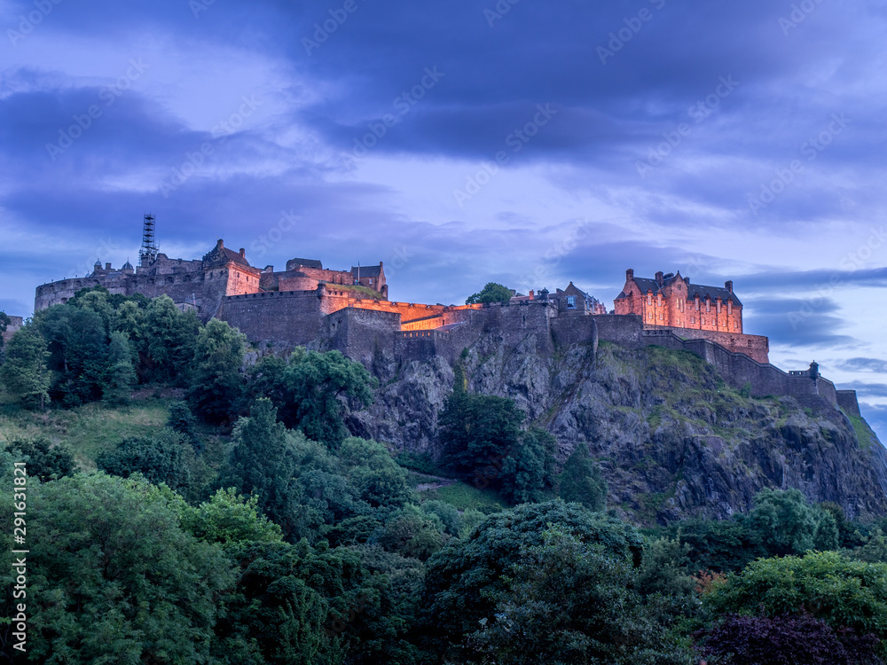 View of Edinburgh Castle at night from Princes Street.