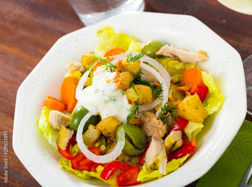Salad with chicken, eggplants, greens