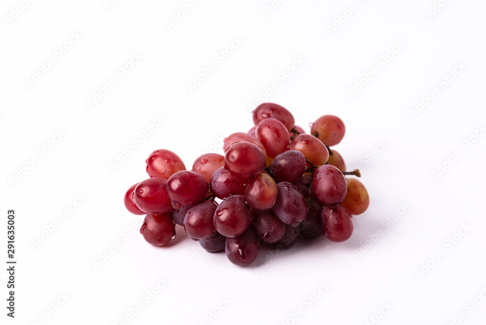 Bunch ripe red grape isolated on white background. 