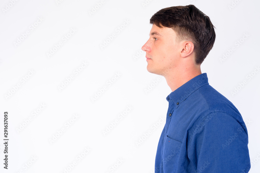 Closeup profile view of young handsome businessman Closeup profile view of young handsome businessman