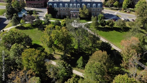 AERIAL: Moving Forward While Tilting Up to Show Sir Howard Douglas Hall on the UNB Fredericton Campus in Center Frame photo