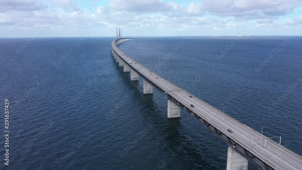 Dolly left towards bridge, impressive work of engineering, contemporary bridge in Scandinavia, Sweden and Denmark, Aerial view Dolly left towards bridge, impressive work of engineering, contemporary bridge in Scandinavia, Sweden and Denmark, Aerial view