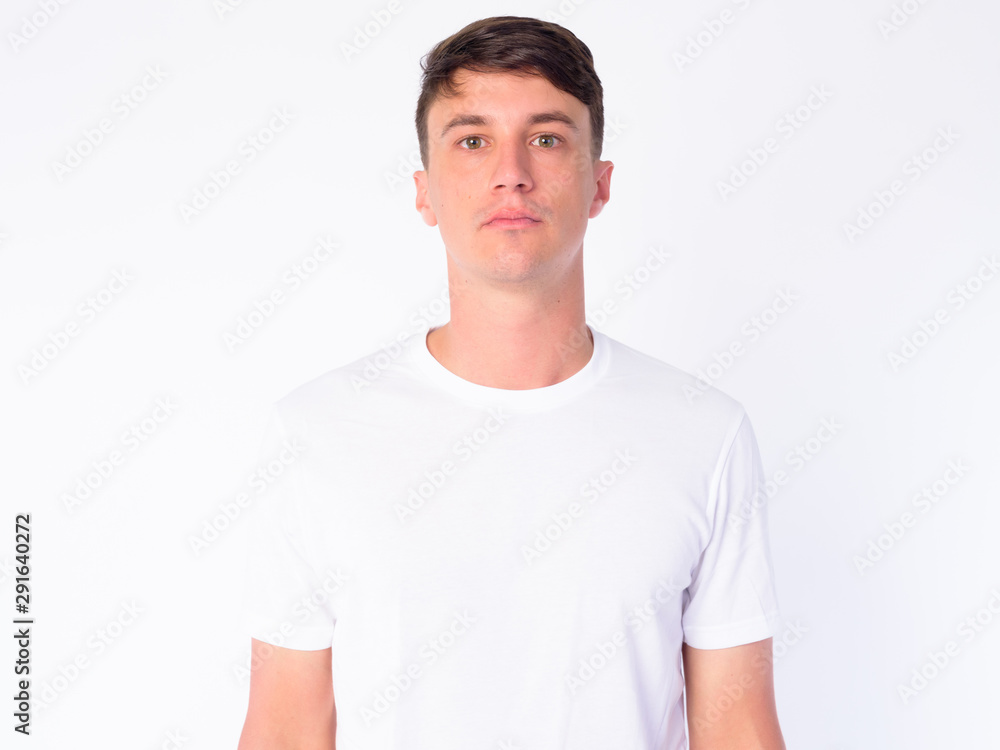 Portrait of young handsome man looking at camera Portrait of young handsome man looking at camera