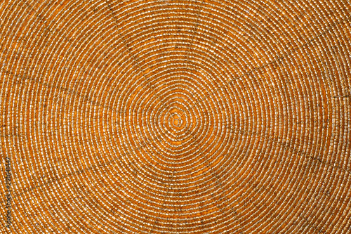 Gold table mat surface as background, closeup