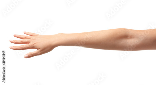 Young woman holding her hand on white background, closeup