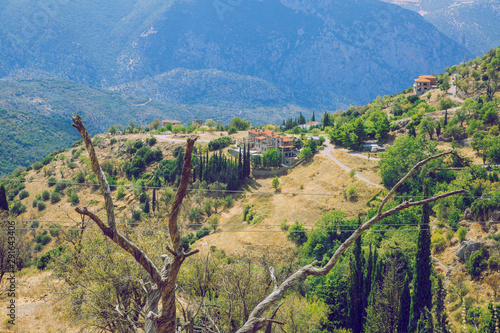 Fototapeta Naklejka Na Ścianę i Meble -  City Arachova. Greek Republic. City streets and mountain views. Old buildings. 13. Sep. 2019.