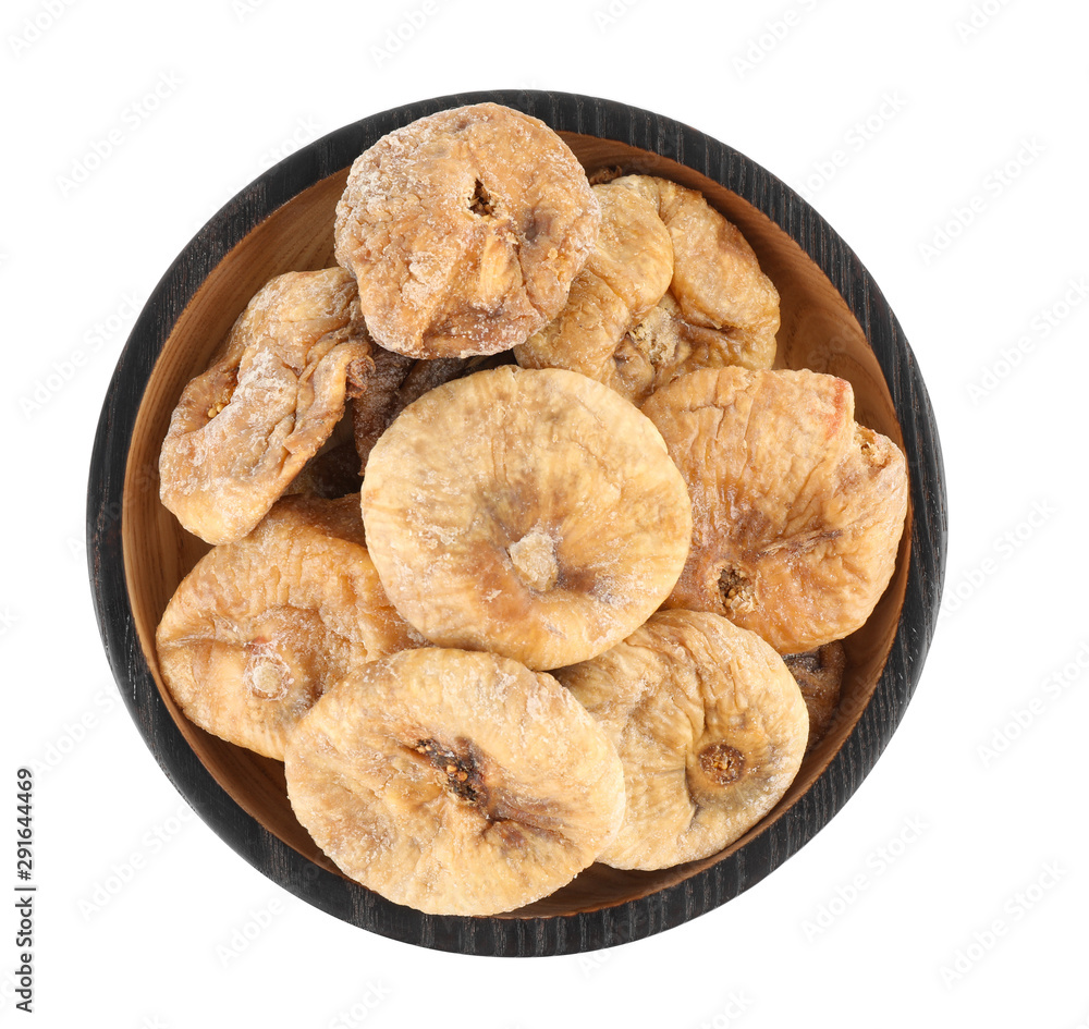 Black wooden plate of dried figs on white background, top view
