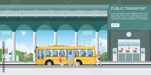 People getting on bus at bus terminal.