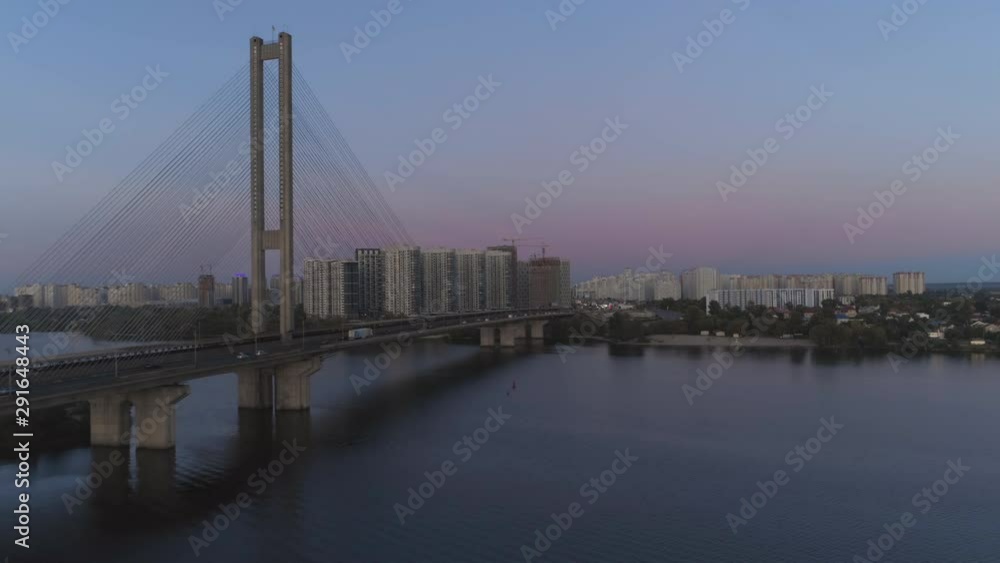 4k aerial pink and purple sunset over downtown. Modern city, bridge, water 4k aerial pink and purple sunset over downtown. Modern city, bridge, water