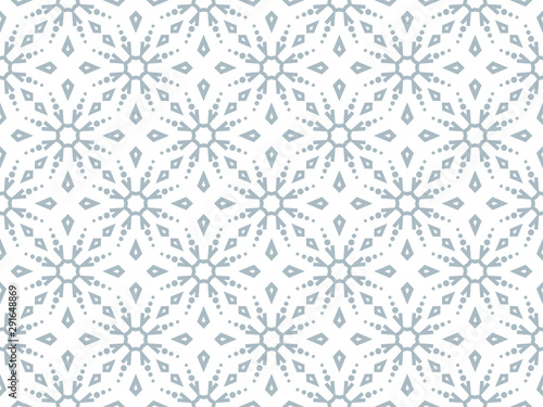 Abstract geometric pattern with snowflakes. A seamless vector background. White and blue texture. Graphic modern pattern.