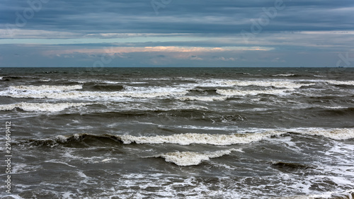 Storm at sea, big foamy waves