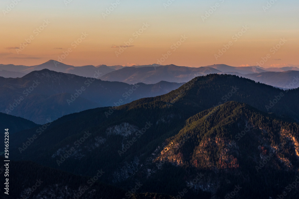 Sunset on the peaks. Mount Lussari, last lights towards dusk. Italy