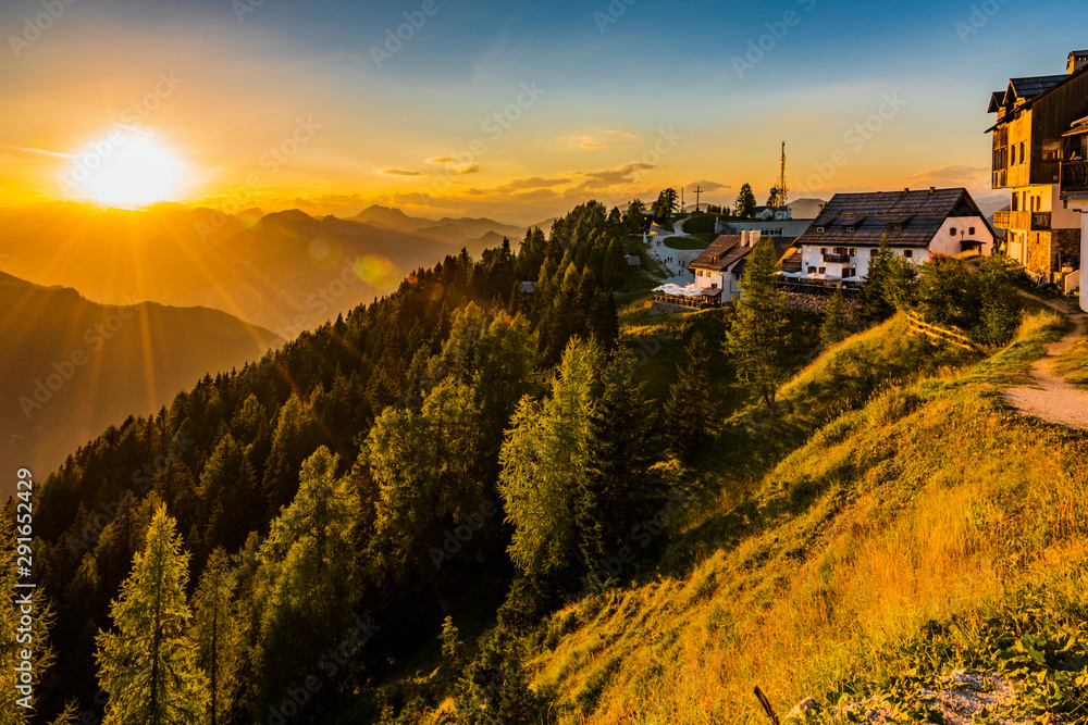 Sunset on the peaks. Mount Lussari, last lights towards dusk. Italy