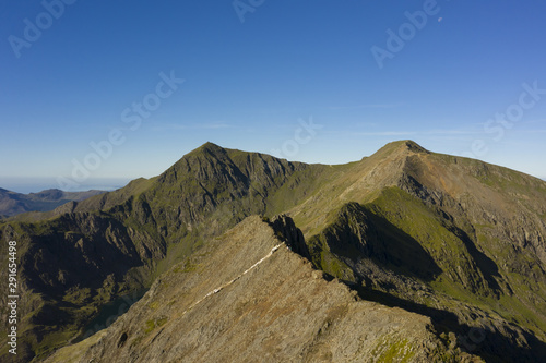 Snowdonia mountain range in Wales, UK with Crib Goch and Mount Snowdon summits photo