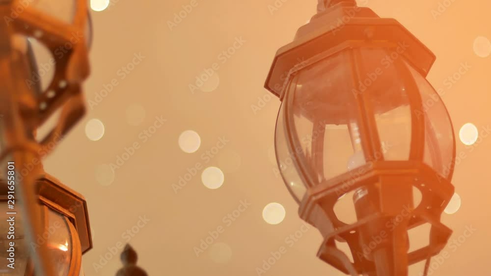 street lamp with light leak on warm atmosphere and light bokeh in the background street lamp with light leak on warm atmosphere and light bokeh in the background