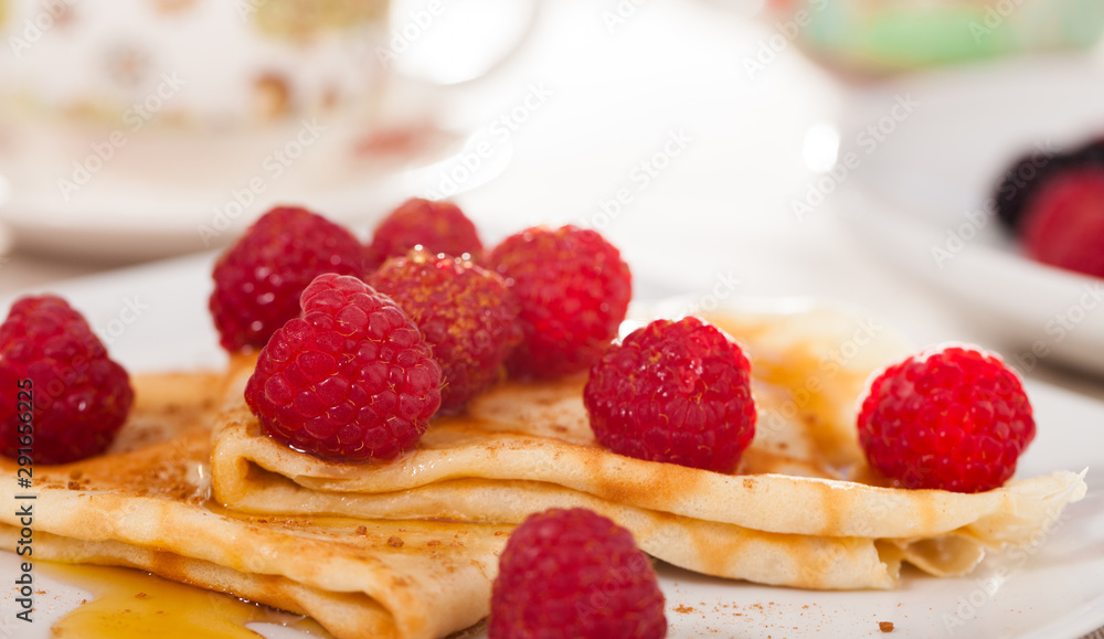 delicious pancakes with fresh raspberries and honey delicious pancakes with fresh raspberries and honey