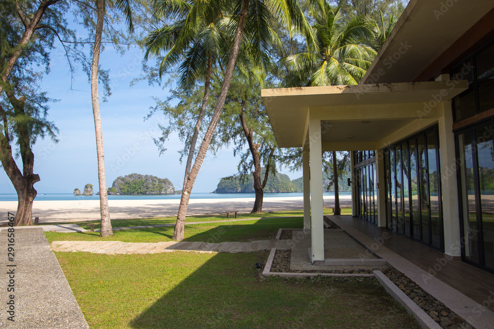 Naklejka premium Modern building on a tropical lonely beach in Malaysia