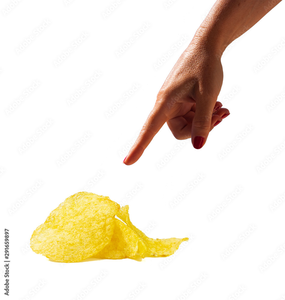 HAND POINTING FRIED POTATOES INDICATING AN NON-HEALTHY FOOD. POTATOES WITH CALORIES AND FATS HAND POINTING FRIED POTATOES INDICATING AN NON-HEALTHY FOOD. POTATOES WITH CALORIES AND FATS
