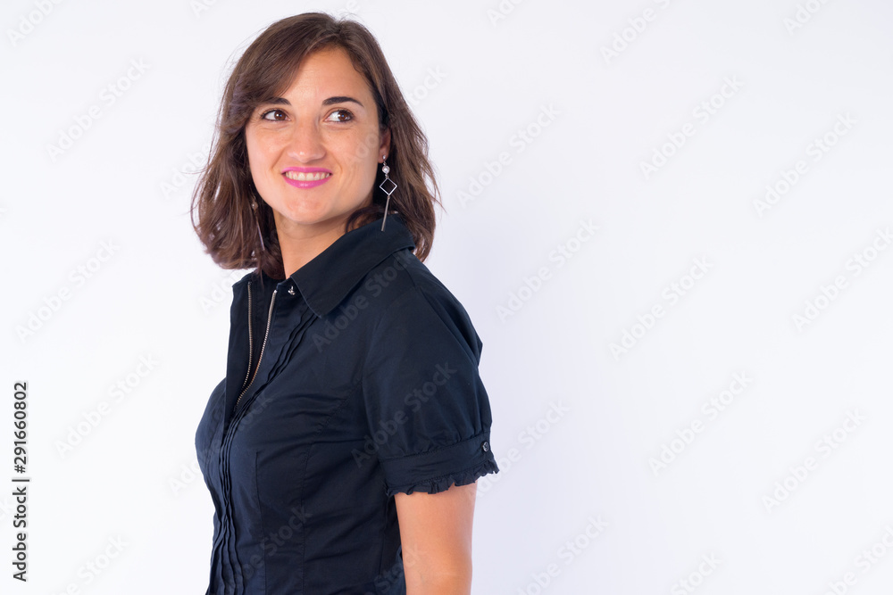 Portrait of happy beautiful businesswoman thinking and looking back Portrait of happy beautiful businesswoman thinking and looking back