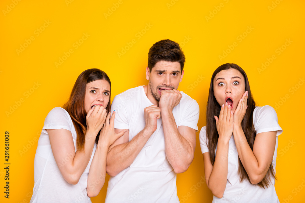 Portrait of three nice-looking attractive lovely nervous devastated miserable frustrated person expressing fear grief omg isolated over bright vivid shine yellow background Portrait of three nice-looking attractive lovely nervous devastated miserable frustrated person expressing fear grief omg isolated over bright vivid shine yellow background