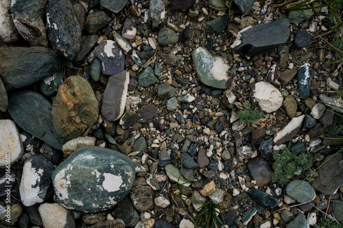 The texture of a shallow river stone. Pebble Background Image