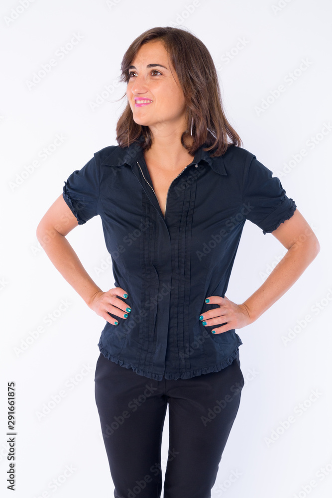 Portrait of happy beautiful businesswoman thinking and looking up Portrait of happy beautiful businesswoman thinking and looking up