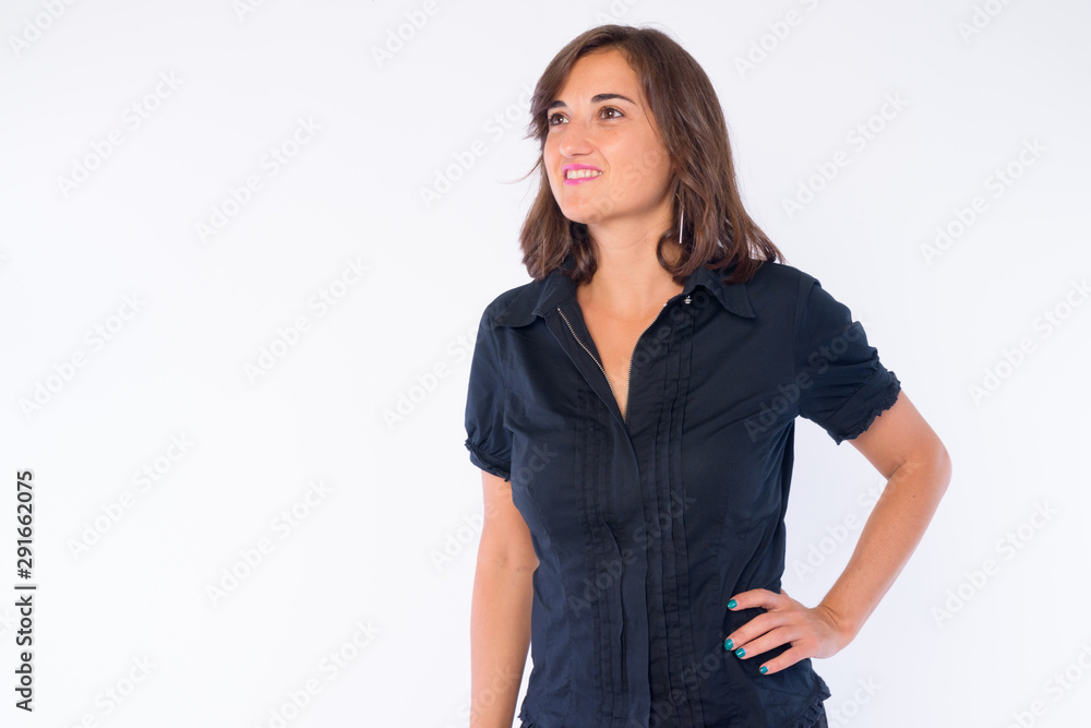 Portrait of happy beautiful businesswoman thinking and looking up Portrait of happy beautiful businesswoman thinking and looking up