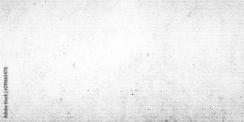 Abstract halftone dotted background. Grunge effect vector texture
