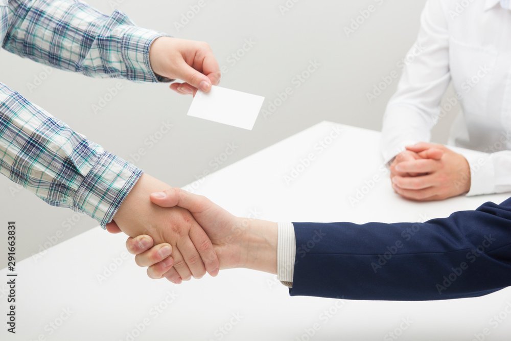 Obraz premium business executive exchanging business card blank. Copy space