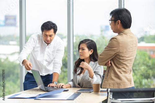 Business partners meeting in office, working at their project. Free Download Business partners meeting in office, working at their project. - GFXLoad